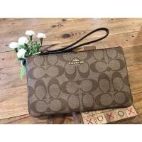 ราคา LARGE WRISTLET IN SIGNATURE (COACH F58695) (2855531846)