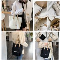 ราคา LKGB77112 กระเป๋าทรงสี่เหลี่ยมแนวตั้ง กระเป๋าสไตล์มินิมอลเก๋ๆ เหมาะสำหรับผู้หญิง แฟชั่นน่ารักๆ สีขาว/ดำ (18474424761)