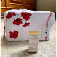 ราคา กระเป๋าใส่เครื่องสำอางค์ Clarins แถมฟรี Intensive Wrap (2677943111)