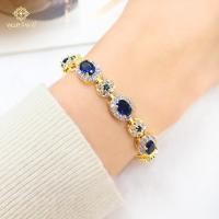 ราคา ส่งฟรี สร้อยข้อมือพลอยไพลินล้อมเพชรคั่นดอกไม้ เครื่องประดับไทย พูนทรัพย์ มีใบรับประกัน HD140H200 (20651540420)