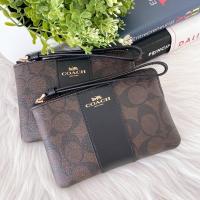 ราคา COACH CORNER ZIP WRISTLET IN SIGNATURE CANVAS #F58035 (8455662686)