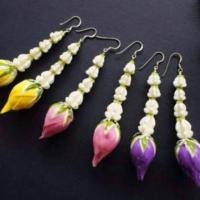 ราคา ต่างหูดอกไม้ไทย (1211993501)