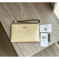 ราคา Coach คล้องมือ ไซส์S 1 ซิป ลายนูนสีครีม (24540160252)
