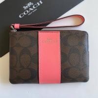 ราคา COACH CORNER ZIP WRISTLET IN SIGNATURE CANVAS #F58035 (4151450124)