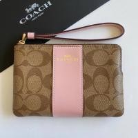 ราคา COACH CORNER ZIP WRISTLET IN SIGNATURE CANVAS #F58035 (5851444996)