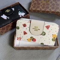 ราคา กระเป๋าสตางค์ใบกลางCoachสีขาวลายกระดิ่ง (19713074933)