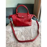 ราคา longchamp le pliage size M หนังแกะ สีแดง (27768246107)