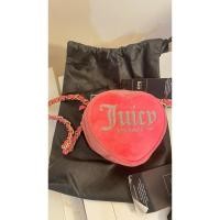 ราคา กระเป๋าใบเล็กทรงหัวใจ cps x juicy couture (27720063168)