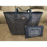 ราคา กระเป๋า Coach แท้ ทรง tote รุ่นไม่มีซิป สีดำ สามารถกลับด้านใช้ได้/ แถมใบลูก1ใบ ซื้อมาวันที่ 29/3/61 ถือแค่2ครั้ง (1048282674)