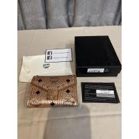 ราคา กระเป๋าสตางค์ MCM สีโรสโกลด์ แท้ 100% มือสอง (16799322234)
