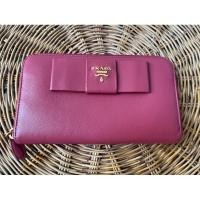 ราคา กระเป๋าสตางค์ใบยาว รุ่นโบว์ สีชมพู ยี่ห้อ PRADA ของแท้ มือสอง (29865641736)