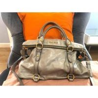 ราคา Miu Miu Bow Bag กระเป๋าหนังแท้ยี่ห้อ Miumiu ของแท้ % (6734992495)