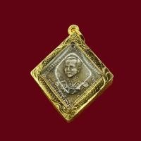 ราคา จี้พระ เหรียญข้าวหลามตัด กรมหลวงชุมพร 2466 เนื้อเงิน พร้อมเลี่ยมกรอบทองไมครอน (25290317594)