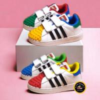 ราคา Putih รองเท้าผ้าใบสีขาวรองเท้าเด็กชายหญิง Adidas Superstar X LEGO Velcro กาวสีขาวสีฟ้าสีแดงสีเหลือง (29362530240)