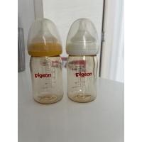 ราคา ขวดนมมือสอง แพคคู่ ขวดนมคอกว้าง สีชา ยี่ห้อ Pigeon ขนาด 5oz/160ml มือสอง พร้อมจุกนมเสมือนมารดา size S (11685421891)