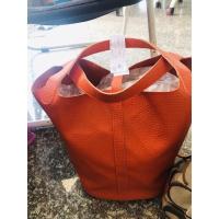 ราคา กระเป๋ามือสองทรงถังแอร์เมดสีส้มหนังแท้ (21339503554)
