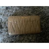 ราคา miu miu zippy รอบ หนังแกะจับจีบ (19786497894)