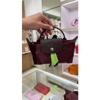 ราคา ขายของแท้เท่านั้น Longchamp pouch mini bag กระเป๋าถือสีแดง (21390616954)