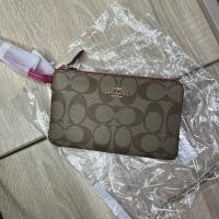 ราคา กระเป๋าตังค์แบรนด์ Coach สีชมพู ไม่เคยใช้ค่ะ สภาพ 100% (25846710498)