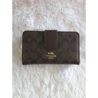 ราคา กระเป๋าสตางค์coachใบยาวแบบแยกช่องใส่เงินเหรียญงานสวยมากพร้อมส่งค่ะสีน้ำตาล (9383976415)