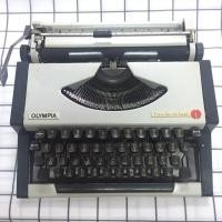 ราคา เครื่องพิมพ์ดีดภาษาไทย OLYMPIA เครื่องสามารถใช้งานได้ปกติ100% มีพร้อมกระเป๋าเครื่องพิมพ์ดีดด้วยค่ะ (4137336658)