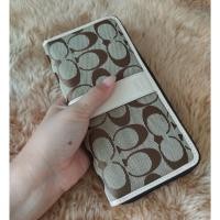 ราคา แท้ กระเป๋าสตางค์ซิปรอบ แบรนด์ COACH ลายซี มือสอง (15981311104)