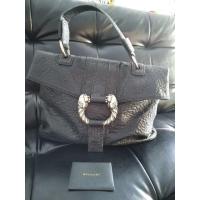 ราคา กระเป๋าBVLGARIหนังแท้สีดำสภาพ99% (1859974418)