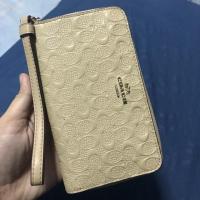 ราคา Coach กระเป๋าตังค์ใบยาวมือสอง คล้องมือ เเท้ 100% สภาพดีเหมือนใหม่ (2261144649)
