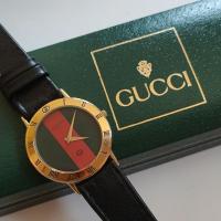 ราคา นาฬิกาวินเทจมือสอง Vintage Gucci พร้อมกล่อง เรือนบาง หน้าเขียวแดง เรียบหรู ระบบ quartz ใส่ได้ทั้งชายและหญิง (22619214714)