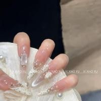 ราคา [ชาแนลครีม] สไตล์ฝรั่งเศสอ่อนโยนอารมณ์ไวท์เทนนิ่งสไตล์ชาแนลโบว์ตาแมวคงที่สูงที่ทําด้วยมือสวมใส่เล็บ (40476158351)