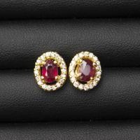 ราคา ต่างหูพลอยทับทิมสีแดงรูปไข่(Natural Ruby) สีชมพูแดงสวยมาก ล้อมด้วยเพชรCZ เรือนเงินแท้ 92.5% ชุบทอง (25537461796)