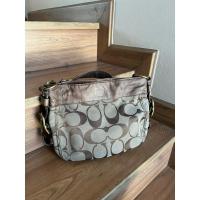 ราคา coach tan canvas tote bag (มือสอง) (25090969283)