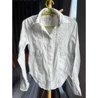 ราคา เสื้อเชิ๊ตแขนยาวสีขาว แบรนด์ CC Double O แท้100% ไซส์xs (27022321560)