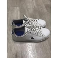 ราคา รองเท้าผ้าใบ lacoste สีขาว ตัดนำ้เงิน ไซต์37.5 (3857946254)