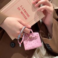 ราคา นกกระจอกเทศสีทึบรูปแบบหนัง Perkin กระเป๋ามินิสําหรับ Apple AirPods 1 2 3rd Pro 2 จี้พวงกุญแจกระเป๋าเก็บมัลติฟังก์ชั่นเคสป้องกันการหล่นพร้อมเชือกเส้นเล็ก (40614466991)