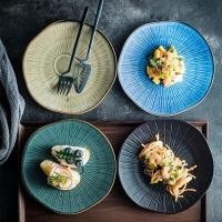 ราคา จานทรงกลมแบบเบี้ยวเล็กน้อยตามขอบ มี 4 สี เซรามิกส์ขอบสีทอง (25705565802)