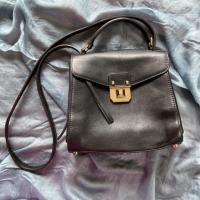 ราคา กระเป๋า MCM มือสอง ของแท้ สีดำ (12340448462)