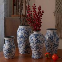 ราคา เครื่องลายครามสีขาวสีฟ้าน้ําแข็งแตกแจกันสไตล์จีนเก่าย้อนยุคเซรามิกดอกไม้สงครามห้องนั่งเล่นโรงแรมทางเข้าเครื่องประดับสูง @ (45902035050)