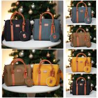 ราคา กระเป๋าผ้าแคนวาส กันน้ำได้ สายหนังสีน้ำตาลเป็นทรงหมอน+แถมฟรีกระเป๋าใส่เหรียญ (21012631202)