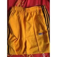 ราคา กางเกงวอร์มโลโก้สหรัฐสีเหลืองแถบดำ มีตำหนิอ่าน (4153253836)