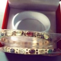 ราคา กำไลพิรอด ตำลึงทอง พลอยแท้เจียหลังเบี้ย ตัวเรือนเงินแท้ เคลือบทอง24k ลงยาสุโขทัย (6543875487)