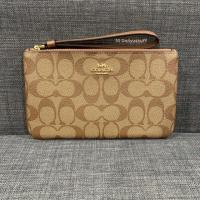 ราคา กระเป๋า - LARGE WRISTLET IN SIGNATURE COATED CANVAS (COACH F58695) (7023109251)