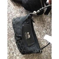 ราคา กระเป๋าโคชทรงพอชแท้ ซิปykk (19600892350)