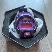 ราคา (ของใหม่) นาฬิกา Casio รุ่น G-SHOCK สีม่วงสดใส พร้อมกล่องเหล็ก และคู่มือครบ จากศูนย์ CMG (16421929156)