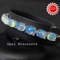 ราคา สร้อยข้อมือ โอปอล Opal พลอยแท้ รูปไข่ ขนาด 6×8 มม.จำนวน 12 เม็ด ตัวเรือนเงิน 925 ชุบทองคำขาว แบบรูด (9857650786)