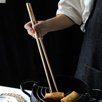 ราคา ตะเกียบสีงาช้างก๋วยเตี๋ยวซูชิแบบใช้ซ้ําได้เครื่องมือทอดหม้อไฟยาวพิเศษ (29256376090)