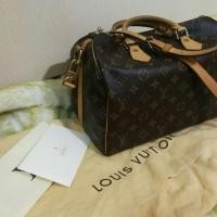 ราคา flamingo_market LV speedy bandouliere monogram 30 (924360216)