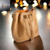 ราคา MCM Essential Small Drawstring in Monogram Leather (16289770218)