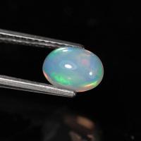 ราคา 0.75 ct พลอยแท้ พลอยดิบ โอปอล (Opal) ทรงไข่หลังเบี้ย สีเขียว สีเหลือง สีแดง และ หลายสี เอธิโอเปีย (57103825626)