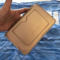 ราคา Best Seller✨ Charles & Keith กระเป๋าซองคล้องมือ รุ่น mini zip pouch (6035065434)